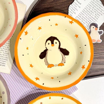 Children's plate with a penguin design in Canada