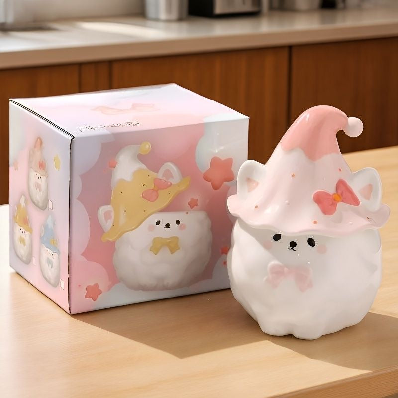 Cute plush Samoyed with a pink hat and bow next to its packaging in a kitchen setting